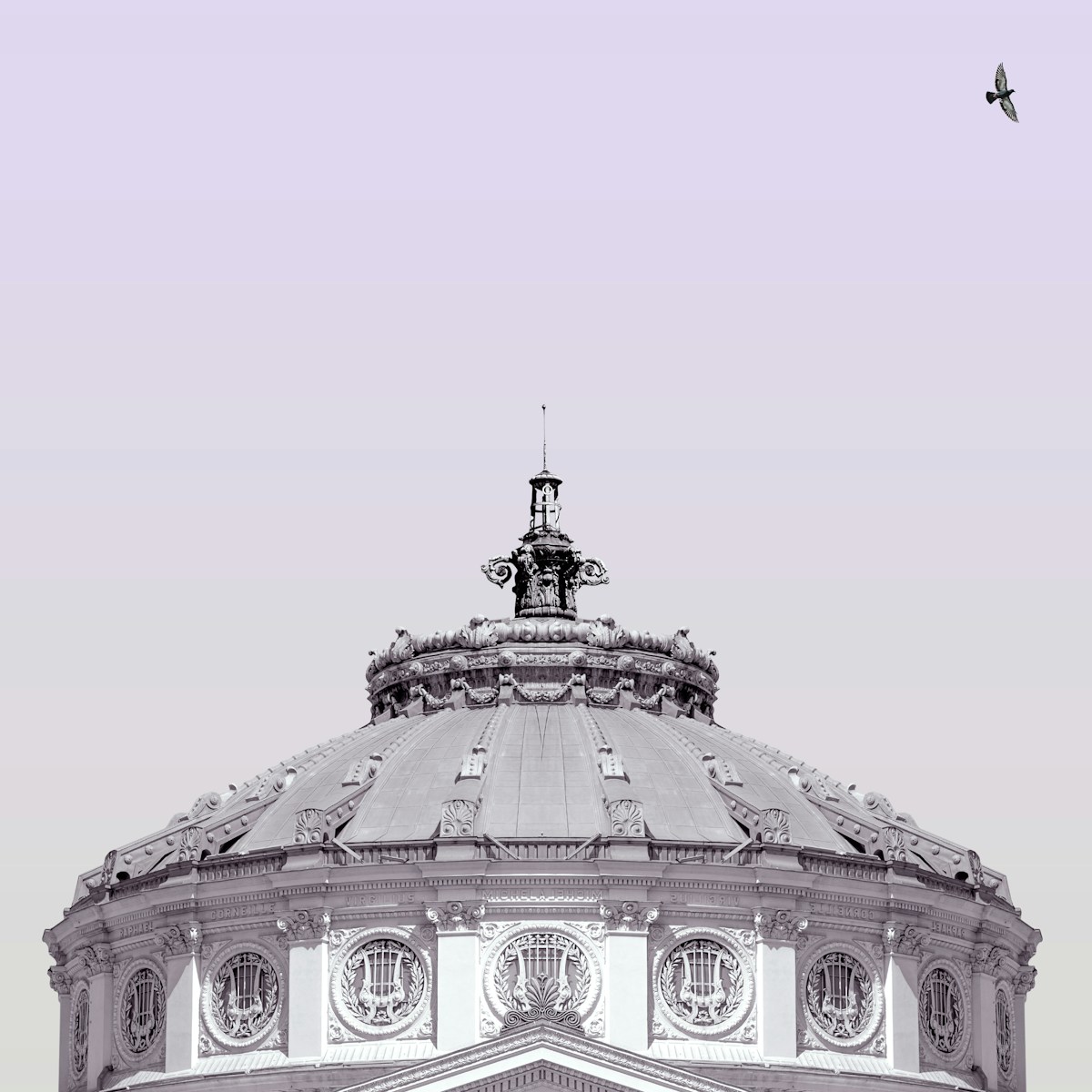 A black and white photo of a domed building